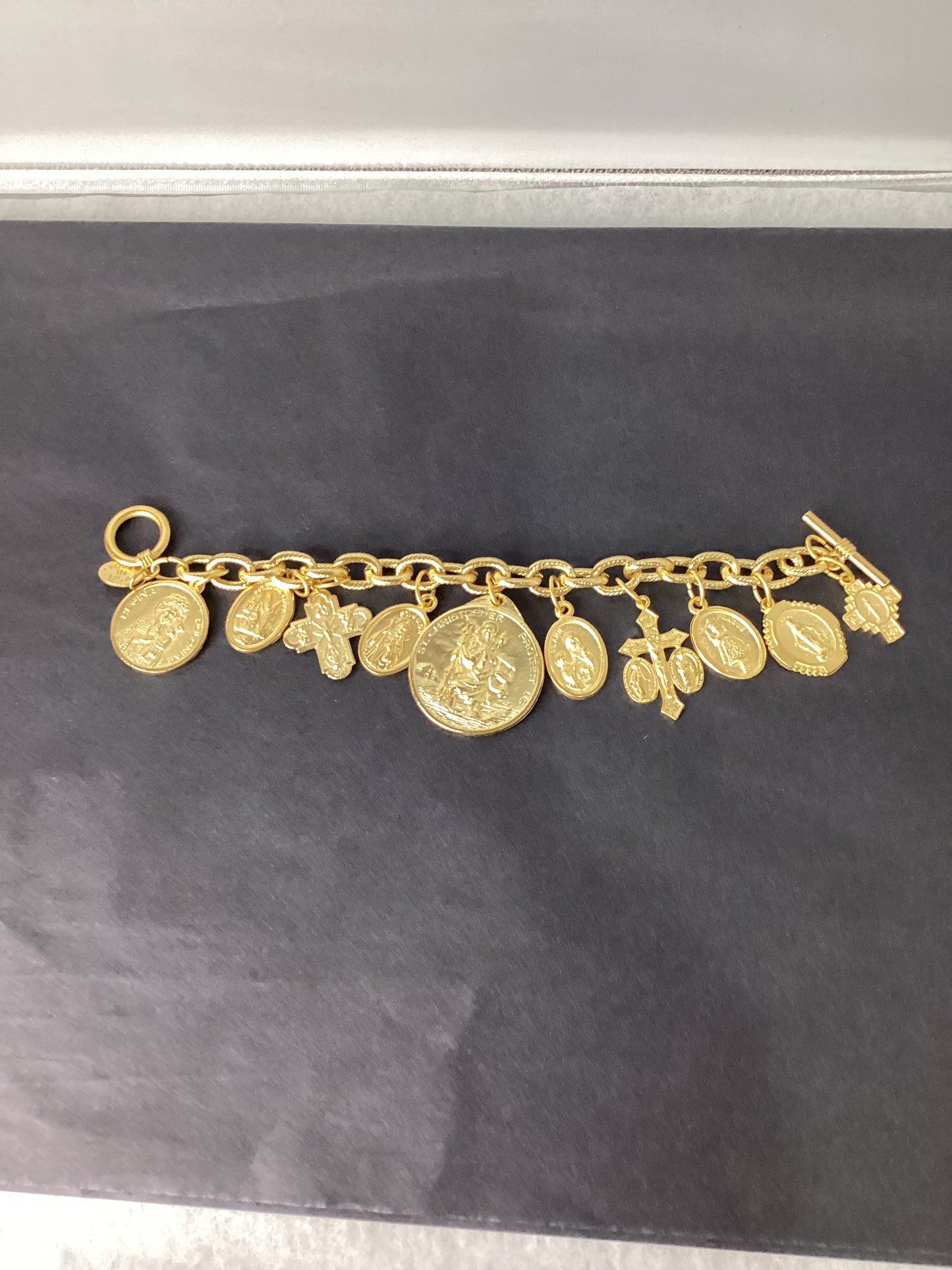 Susan Shaw- Gold Saints Charm Bracelet