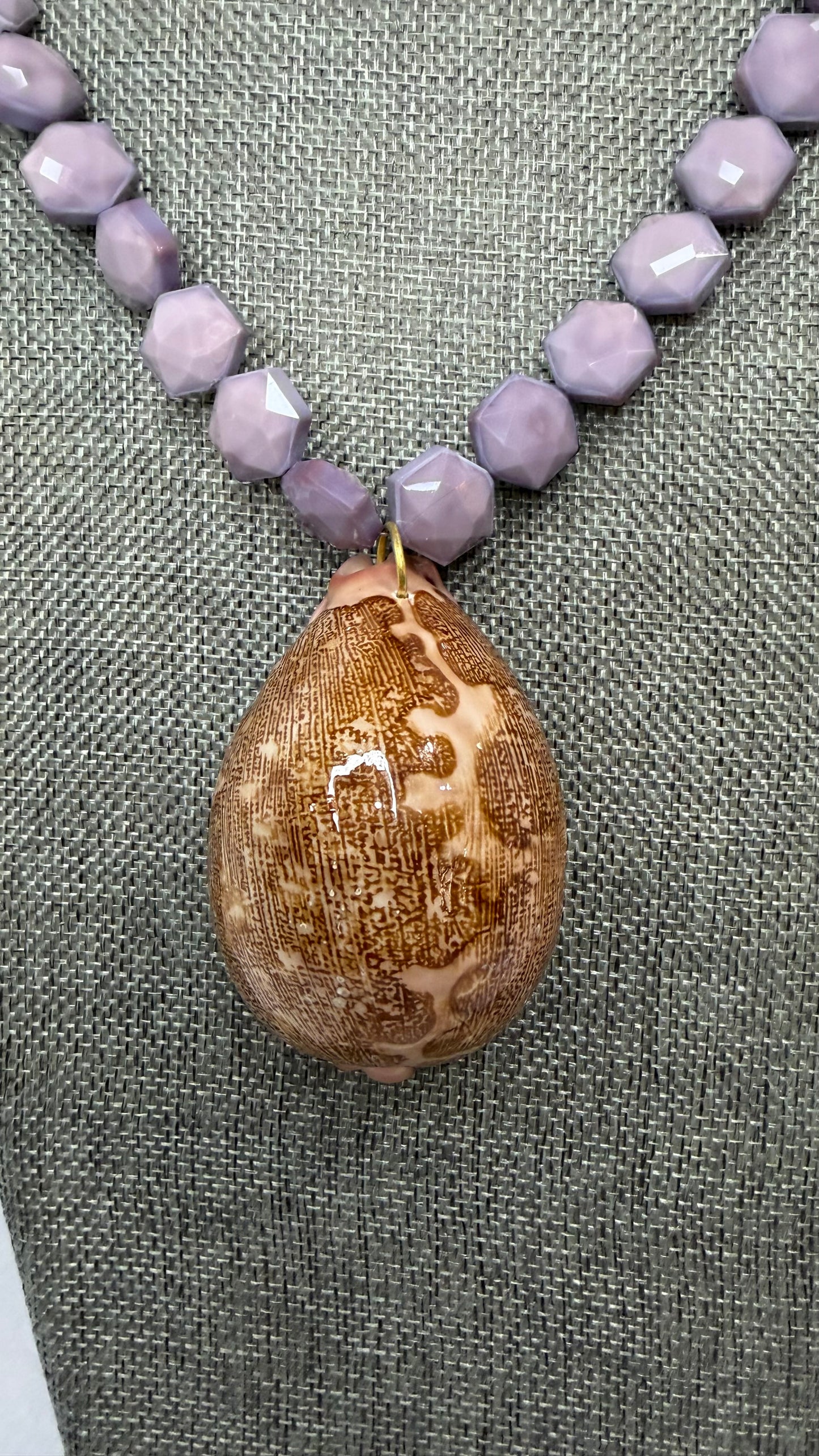 Made cowrie shell necklace