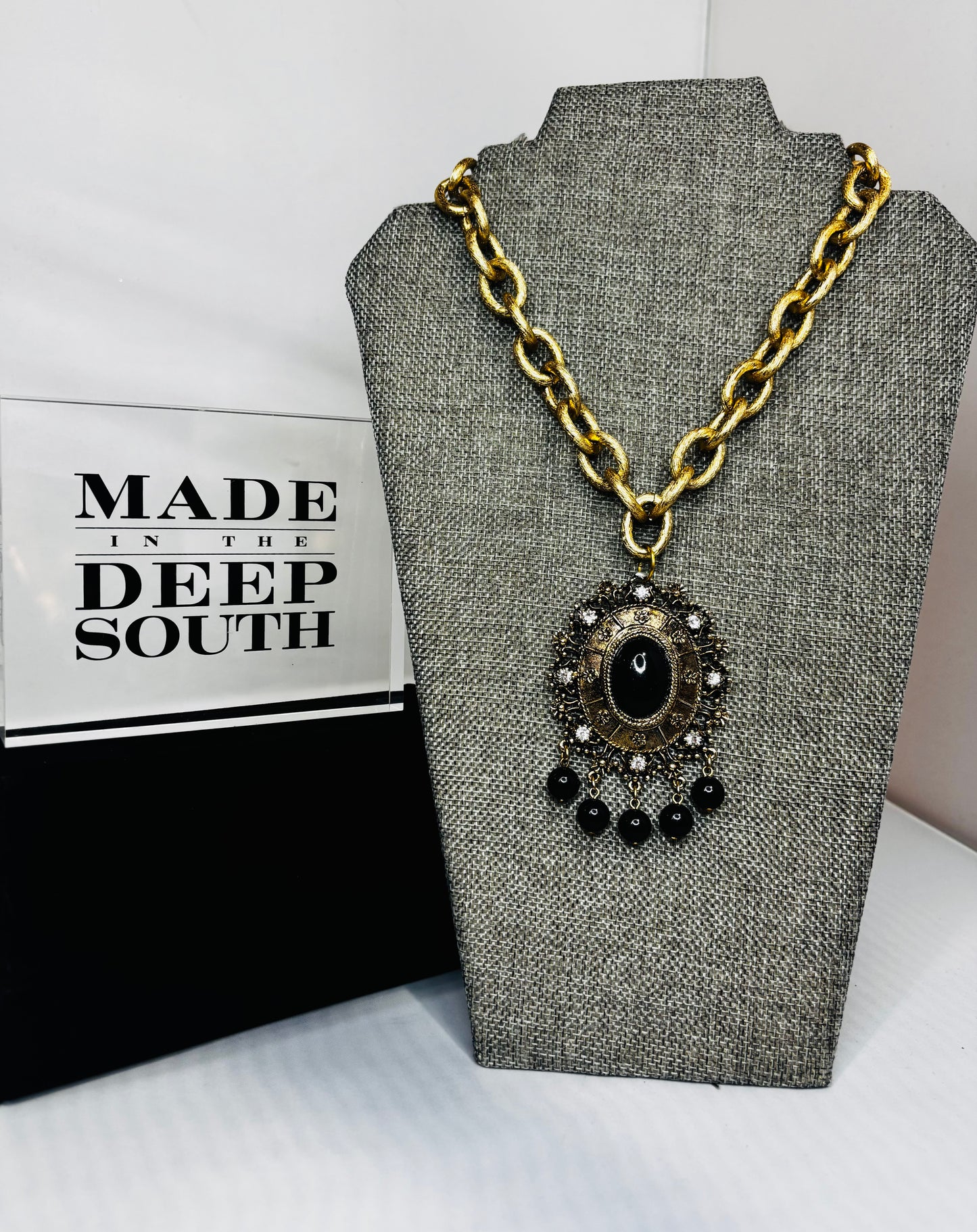MADE - Gold Necklace with Black and Gold Brooch