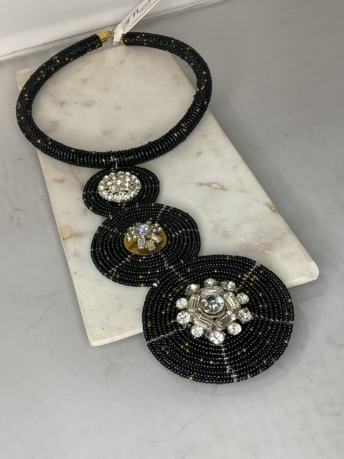 Made triple brooch necklace