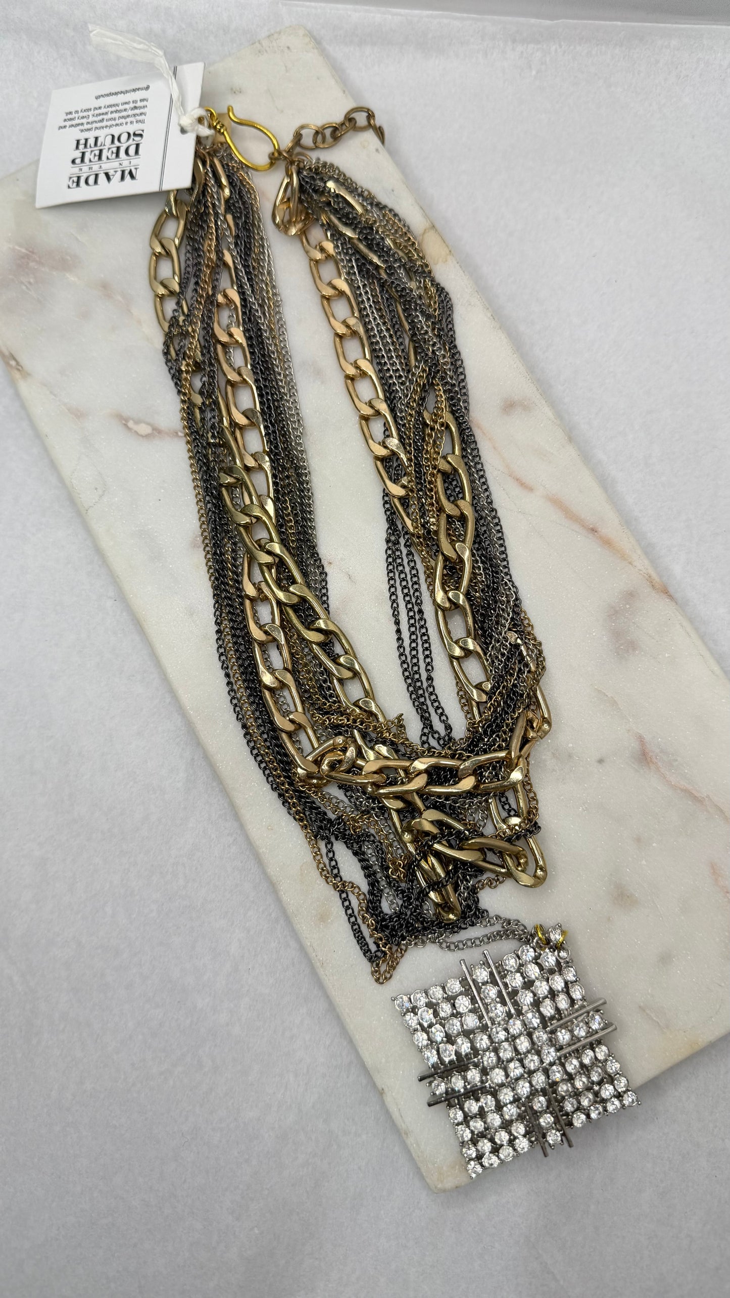 Made layered brooch necklace