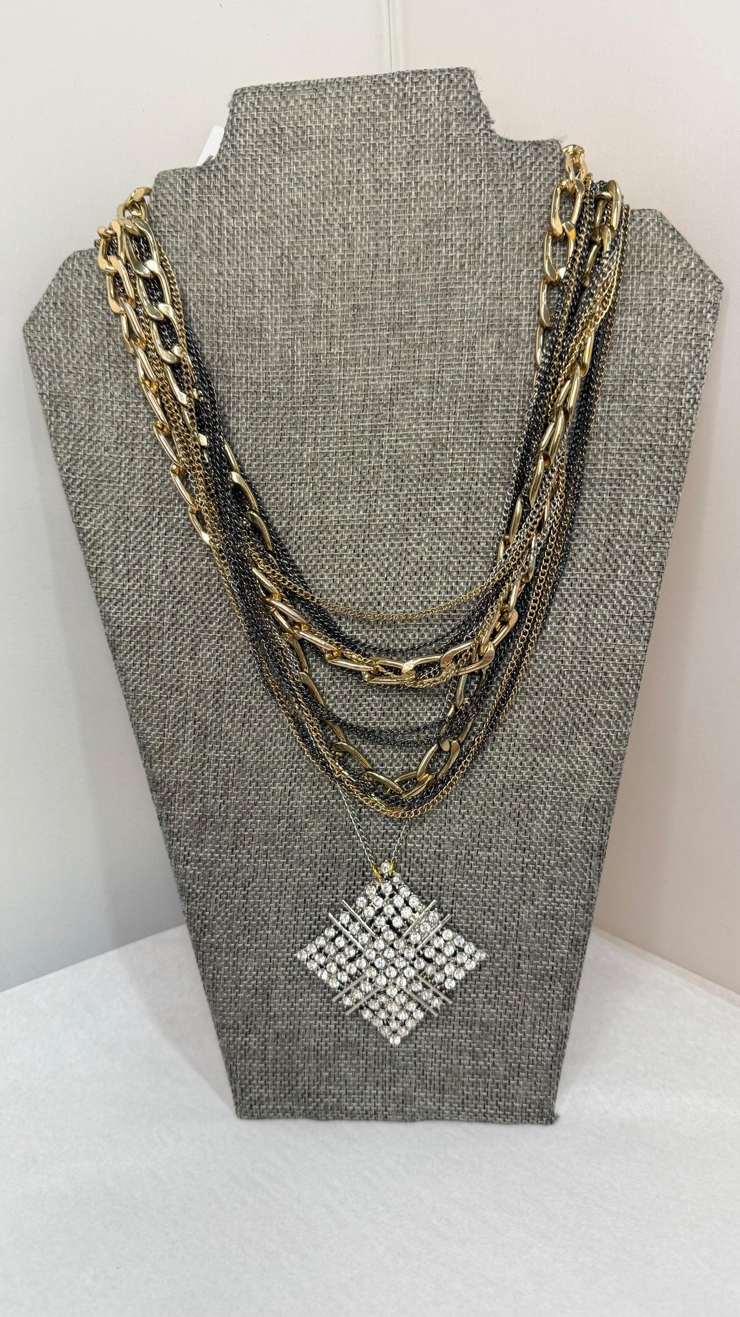 Made layered brooch necklace