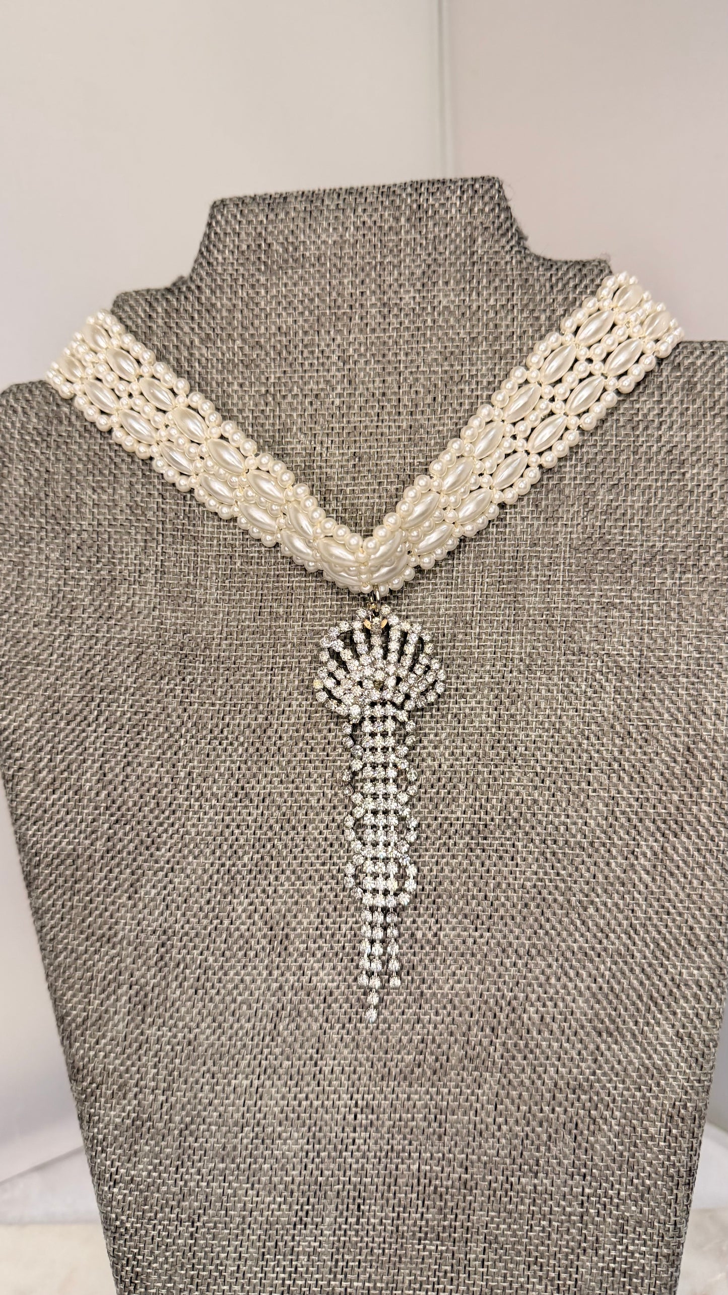 Made white bead necklace