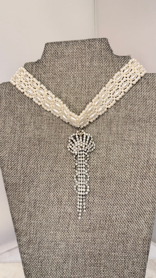 Made white bead necklace