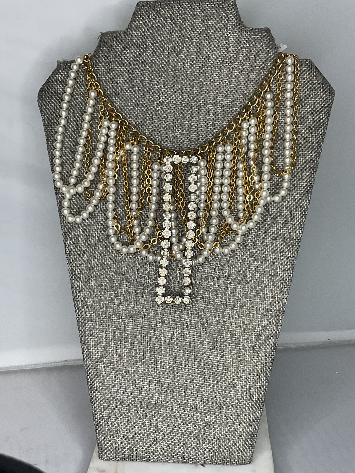 Made sash buckle necklace