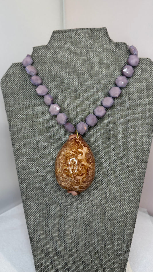 Made cowrie shell necklace