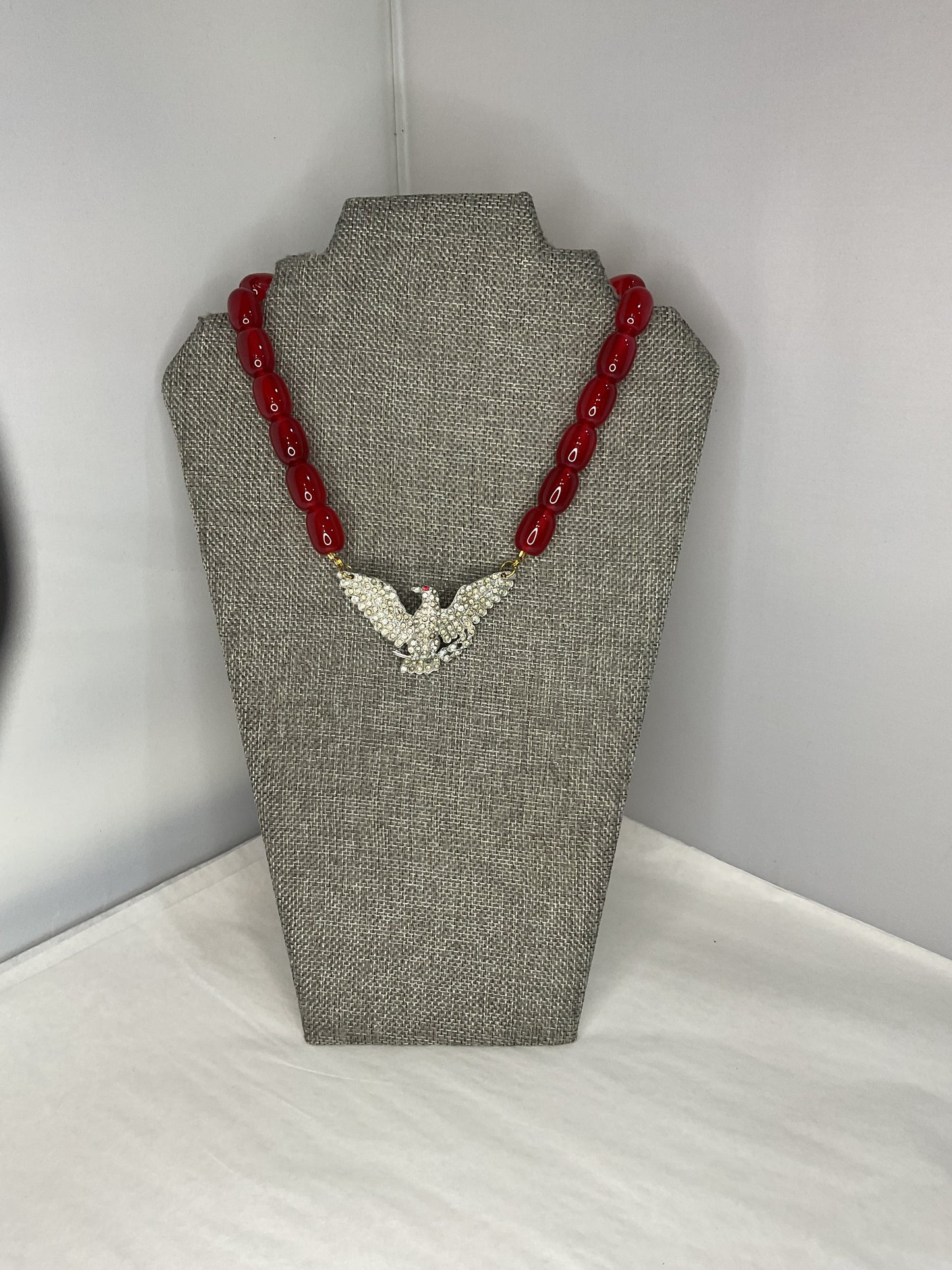 Made red eagle necklace