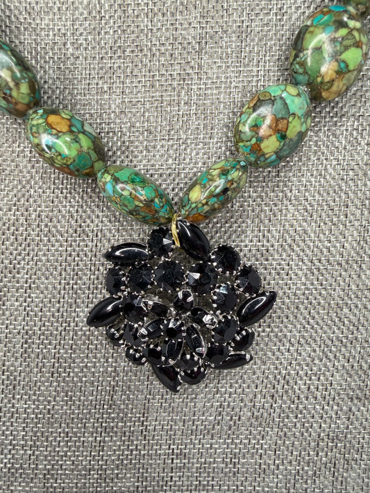 MADE black brooch green necklace