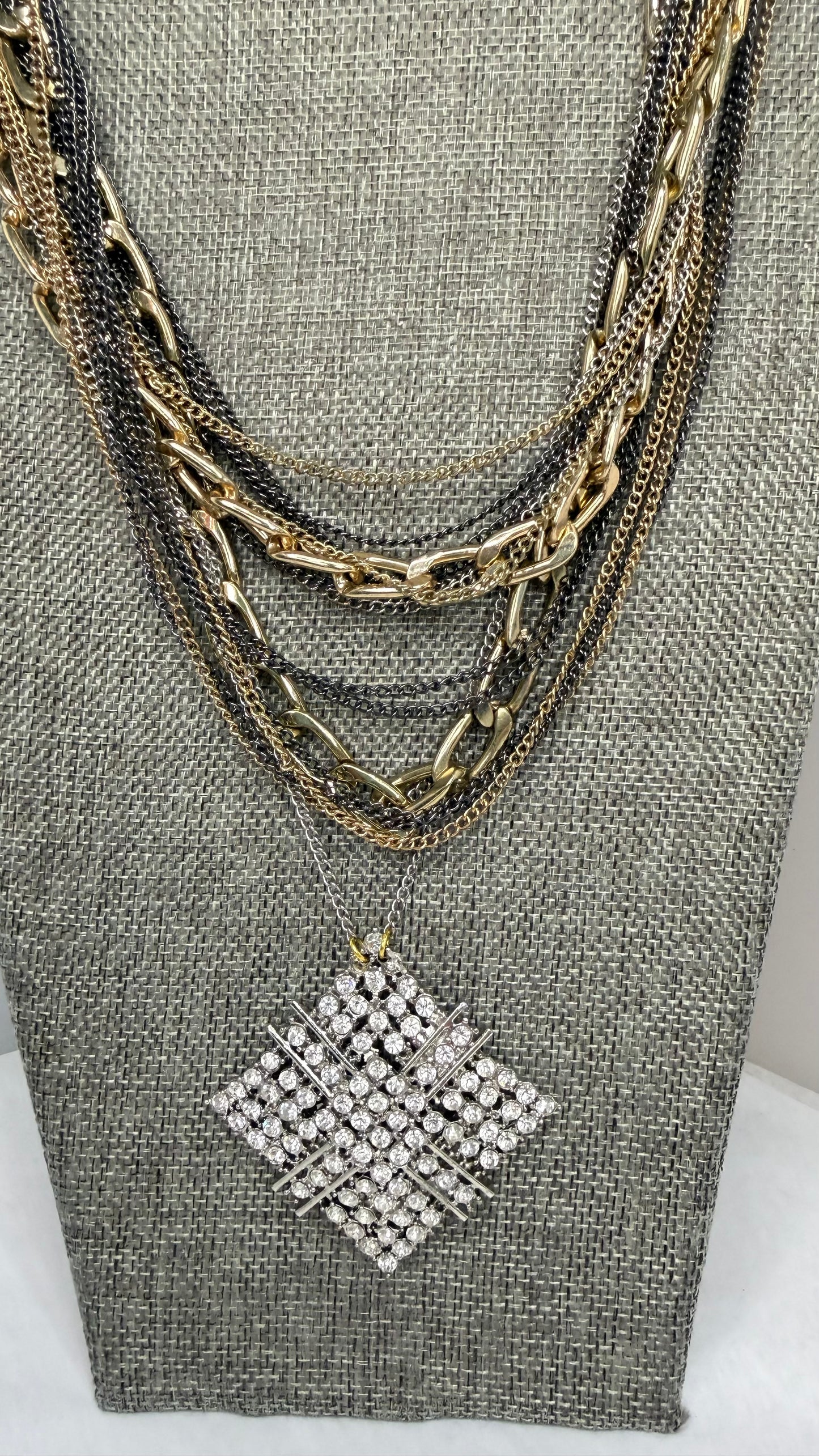 Made layered brooch necklace