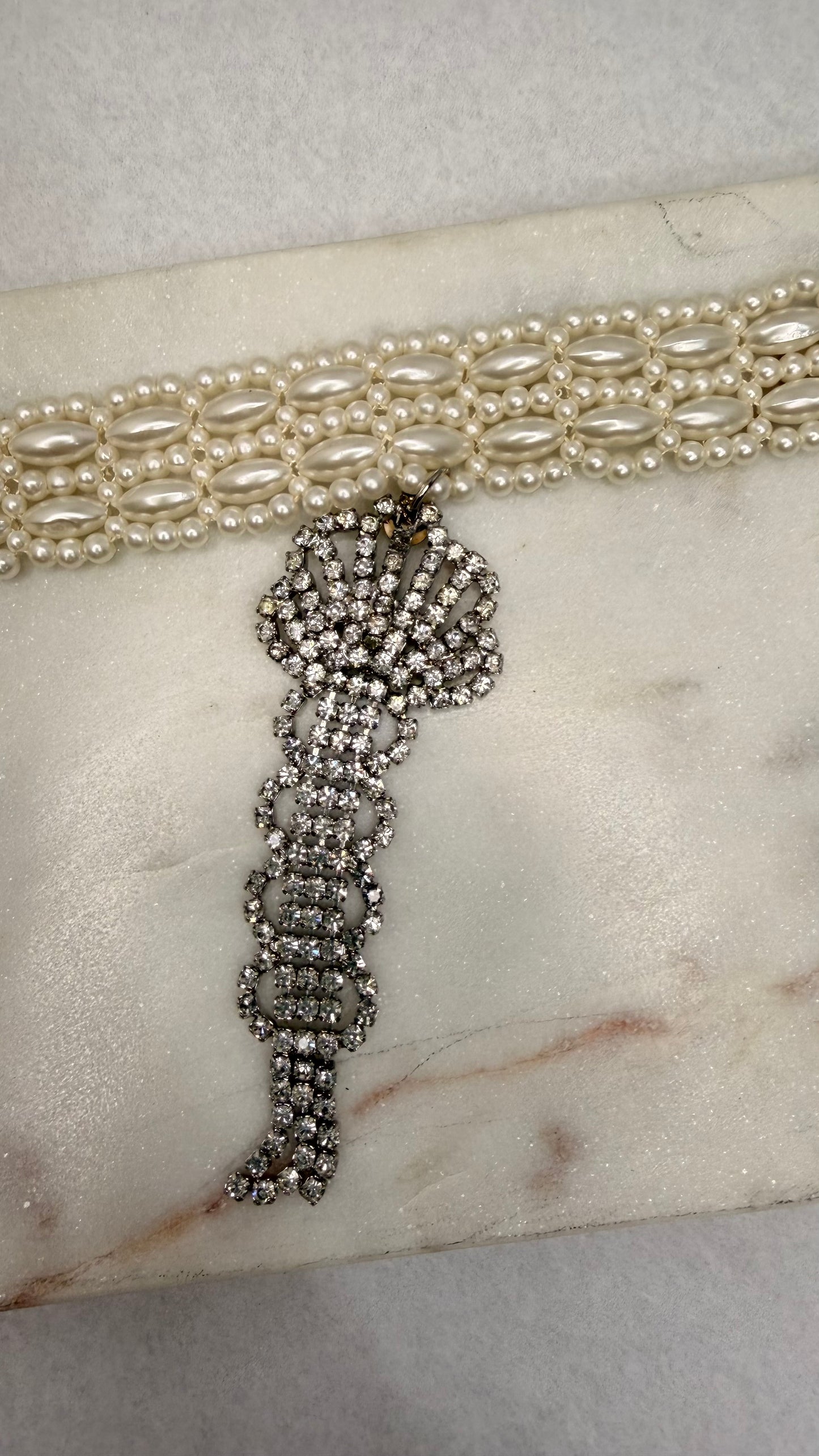 Made white bead necklace