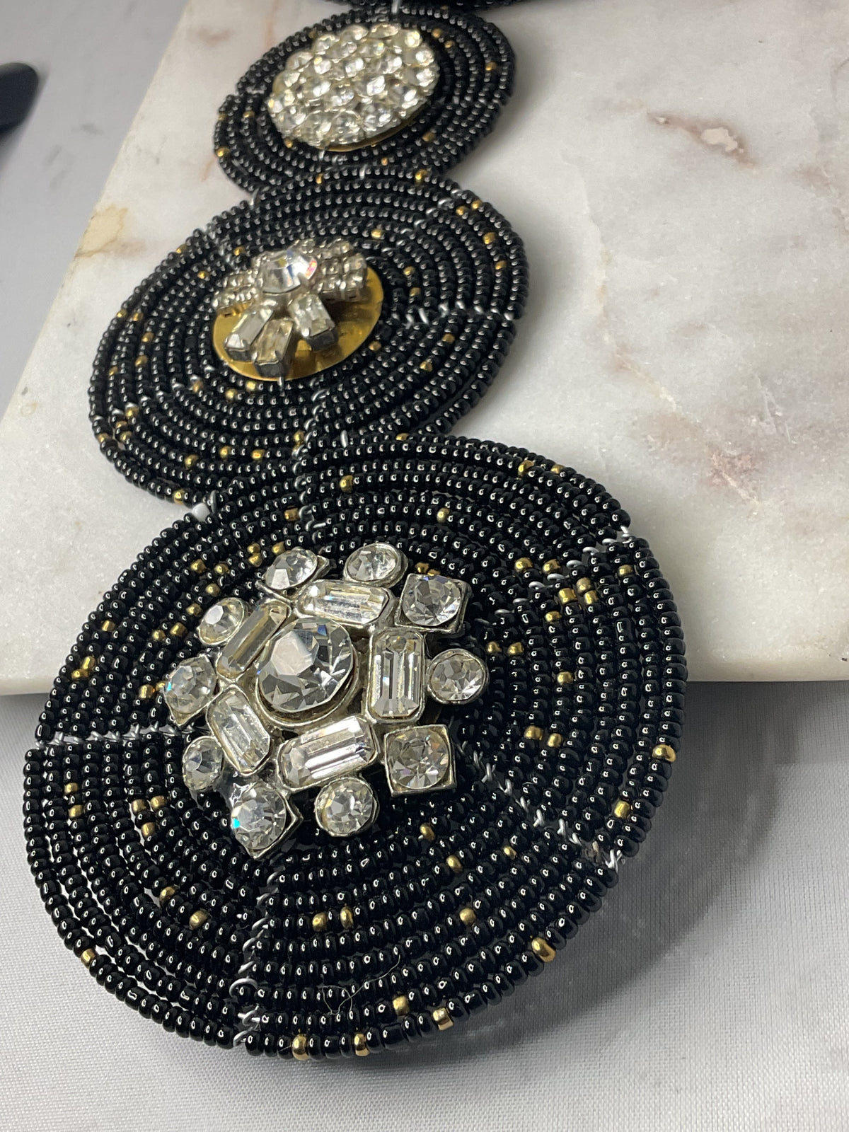 Made triple brooch necklace